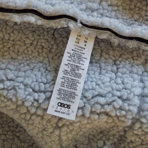 ASOS Design sherpa paneled jacket in black and blue - Picture 7 of 8